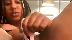 Black goddess plays with pussy