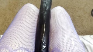 Stroking  my big black dildo